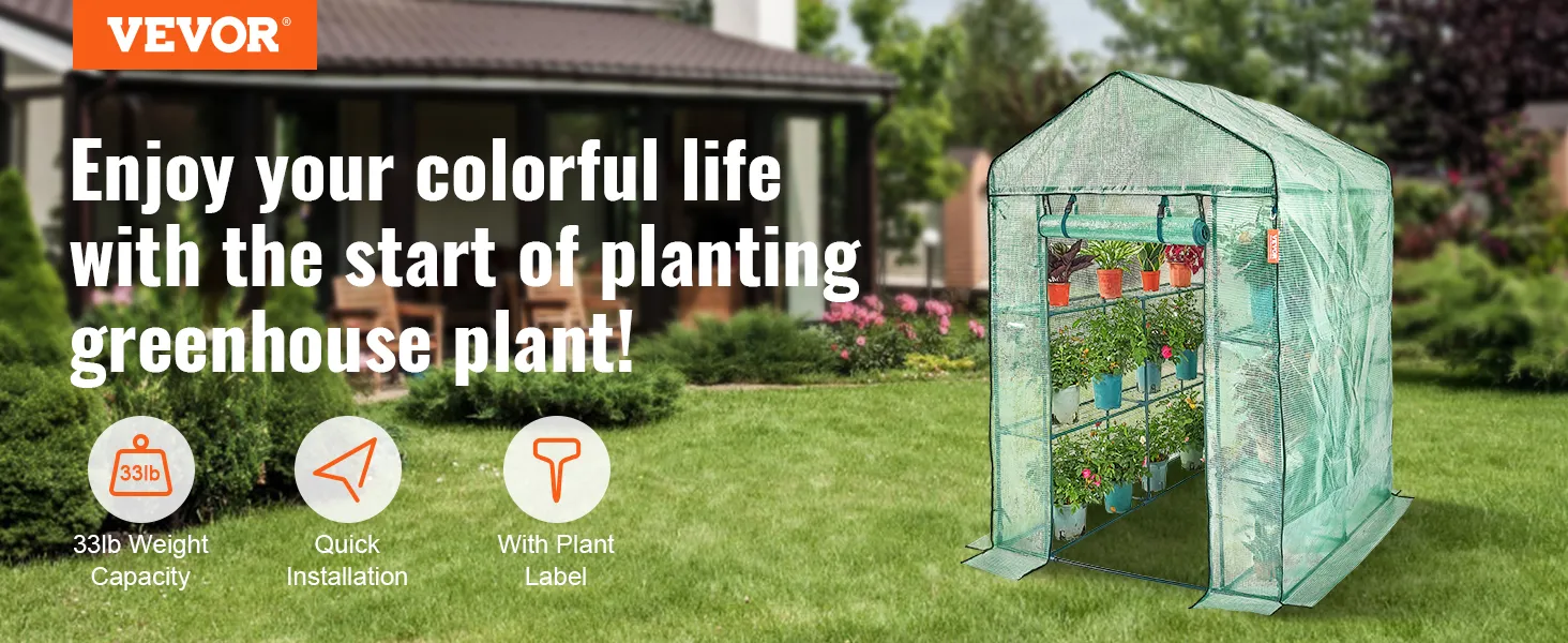 VEVOR walk-in greenhouse with shelves filled with colorful potted plants in a garden setting.