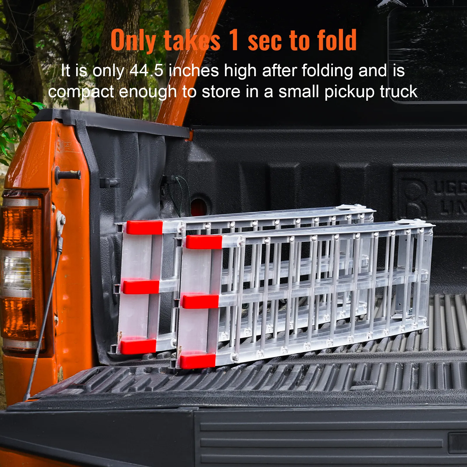 VEVOR aluminum ramp folded in an orange pickup truck bed, showcasing its compactness and portability.