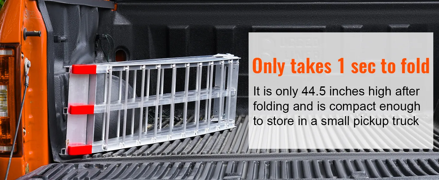 VEVOR motorcycle ramps, folded in a truck bed, compact at 44.5 inches for easy storage.