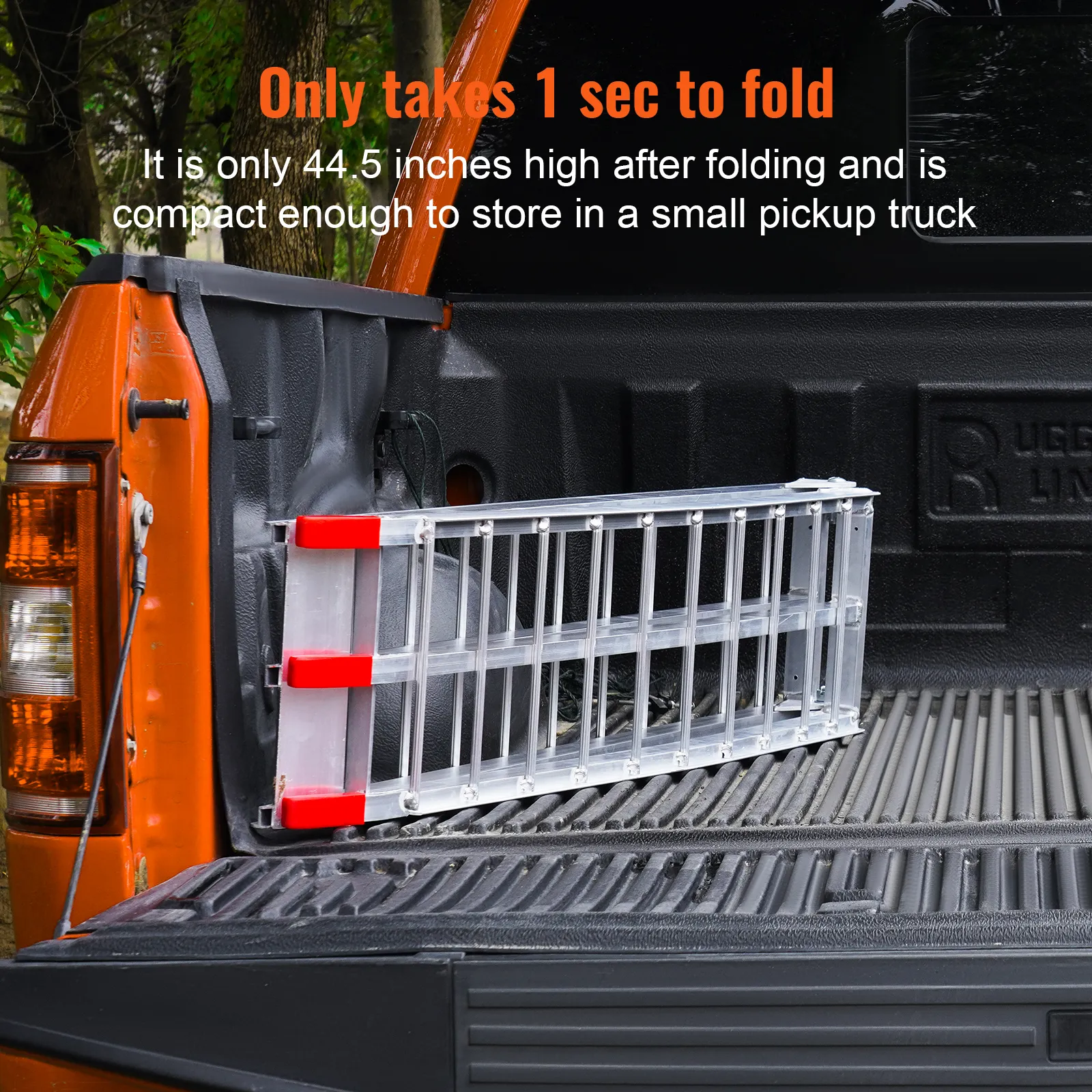VEVOR motorcycle ramps folded in a pickup truck bed, compact at 44.5 inches for easy transport.