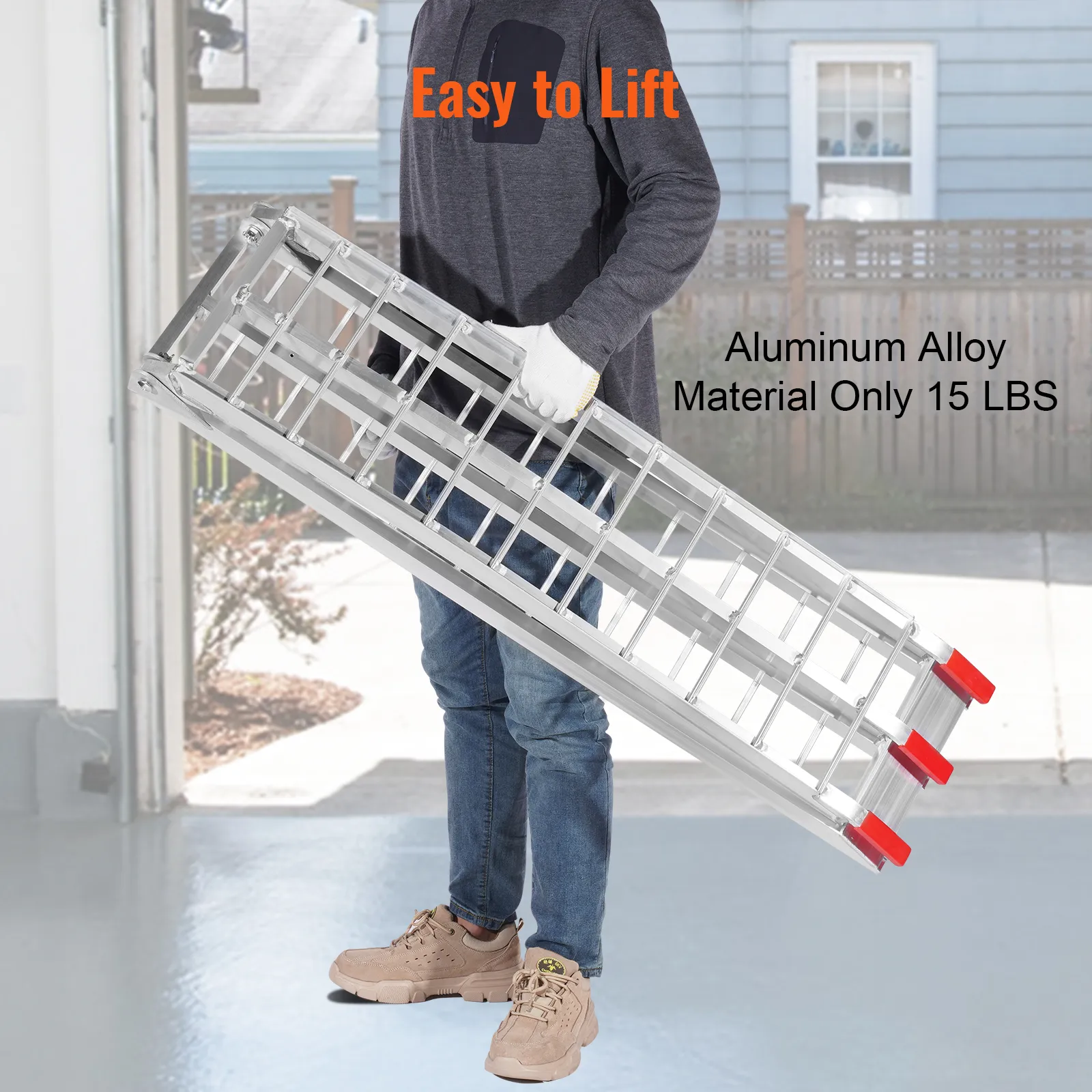 person holding lightweight aluminum VEVOR motorcycle ramps, showcasing easy portability and durability.