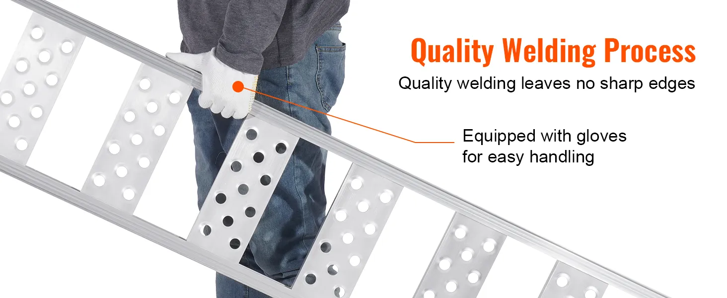 person using VEVOR aluminum loading ramps with gloves for safe handling and smooth welding edges.